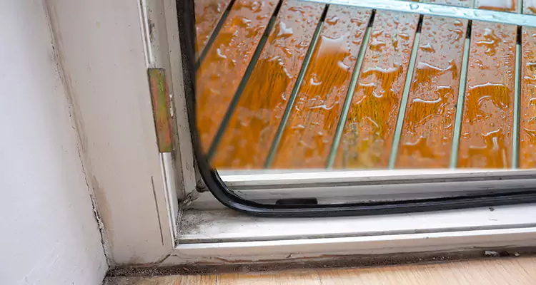 Water Leaking Wooden Patio Doors Repair in Myrtle Grove, FL