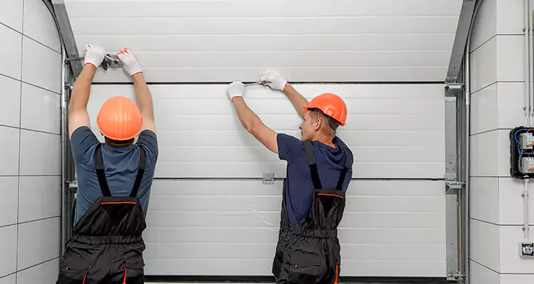 Garage Door Bottom Panel Repair in Myrtle Grove, FL
